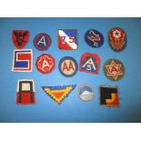 A quantity of WWII American cloth badges