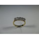 An 18ct gold 5 stone diamond ring, approx finger size J