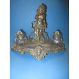 An Edwardian art nouveau cast pewter desk top ink stand