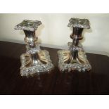 A pair of plated candlesticks