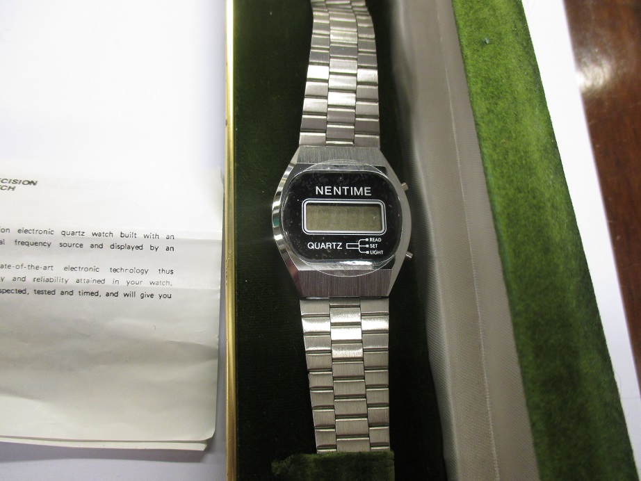 A vintage Nentime quartz watch in unused condition with instructions