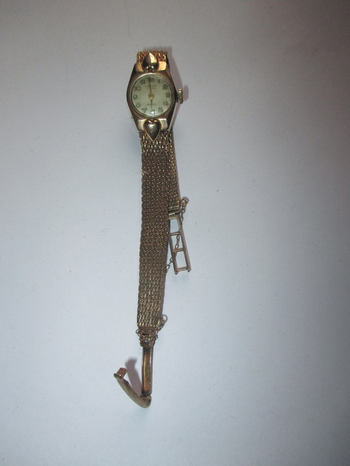 A 9ct gold cased watch and strap, approx gold weight 12.5g