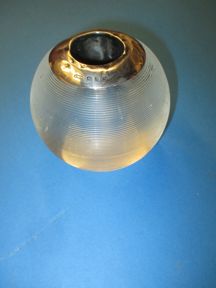 A silver mounted glass match striker