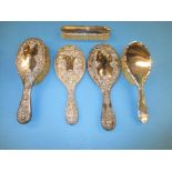 A quantity of silver backed dressing table items