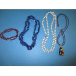 4 Vintage necklaces to include Lapis lazula garnet and one with a gold clasp