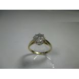 An 18ct gold and diamond solitaire ring, the stone measuring approx 6.69mm