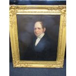 An early 19th century life size oil on canvas portrait painting