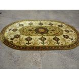 A large vintage oval wool rug