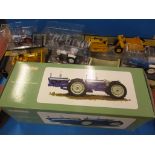 A quantity of good die-cast scale model tractors.