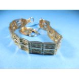 A 9ct yellow gold gate bracelet, approx. weight 30g