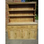 A large vintage waxed pine kitchen dresser