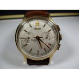 A vintage Tissot chronograph watch with original leather strap.