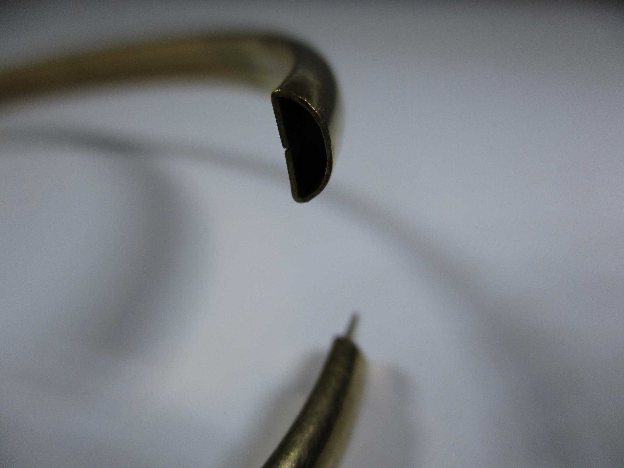 A gold torque type bangle and another yellow metal example - Image 7 of 9