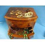 A small desk top walnut 2 drawer chest with contents of jewellery items