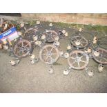 A quantity of 5 branch ceiling lights based on wagon wheels with matching wall lights