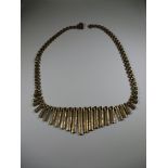 A 9ct yellow gold collar type necklace, approx. weight 30.1g