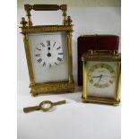 Two vintage carriage/ travel clocks.