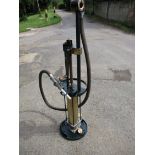 A vintage H J Godwin skeleton type petrol pump