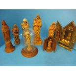 A collection of religious carved wood figures to include examples by Anri.