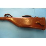 A vintage leather leg of mutton gun case. In good condition with working buckles