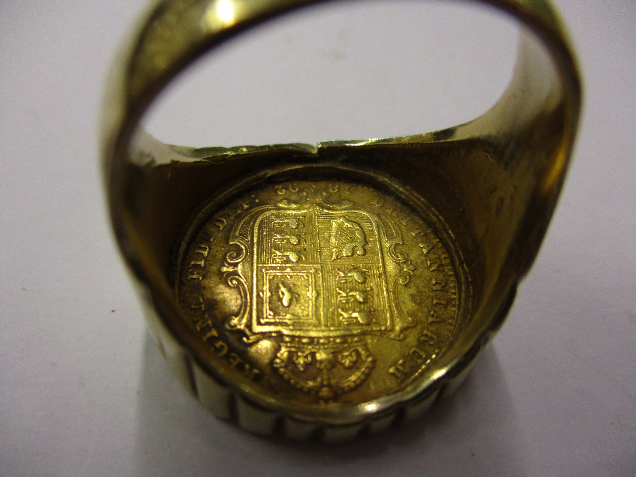 An 1892 gold half sovereign having Jubilee head and shield back set in a 9ct gold ring, approx total - Image 6 of 10