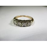 A vintage 14ct gold and platinum 4 stone diamond ring