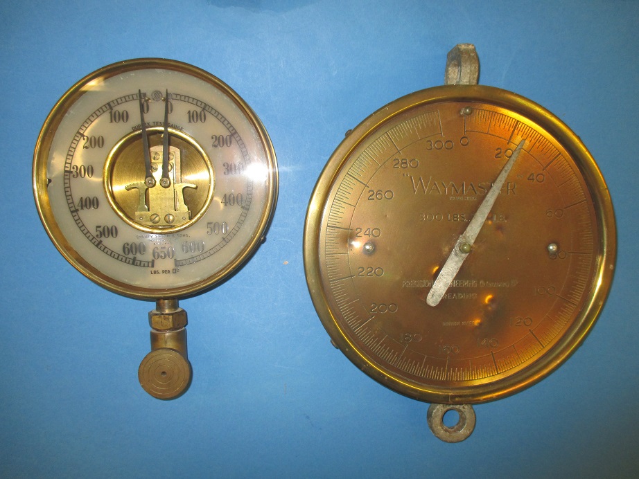 A Sydney Smith & Sons 650LBS. Gauge and a Waymaster 300LBS scale gauge