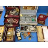 A large quantity of vintage costume jewellery to include a boxed pair of gold collar stud