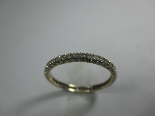 A 9ct gold diamond set full eternity ring