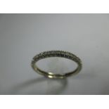 A 9ct gold diamond set full eternity ring