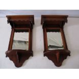 Two pairs of mahogany wall mirrors with candle shelves