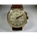 A vintage antimagnetic Helvetia chronograph watch with leather strap.
