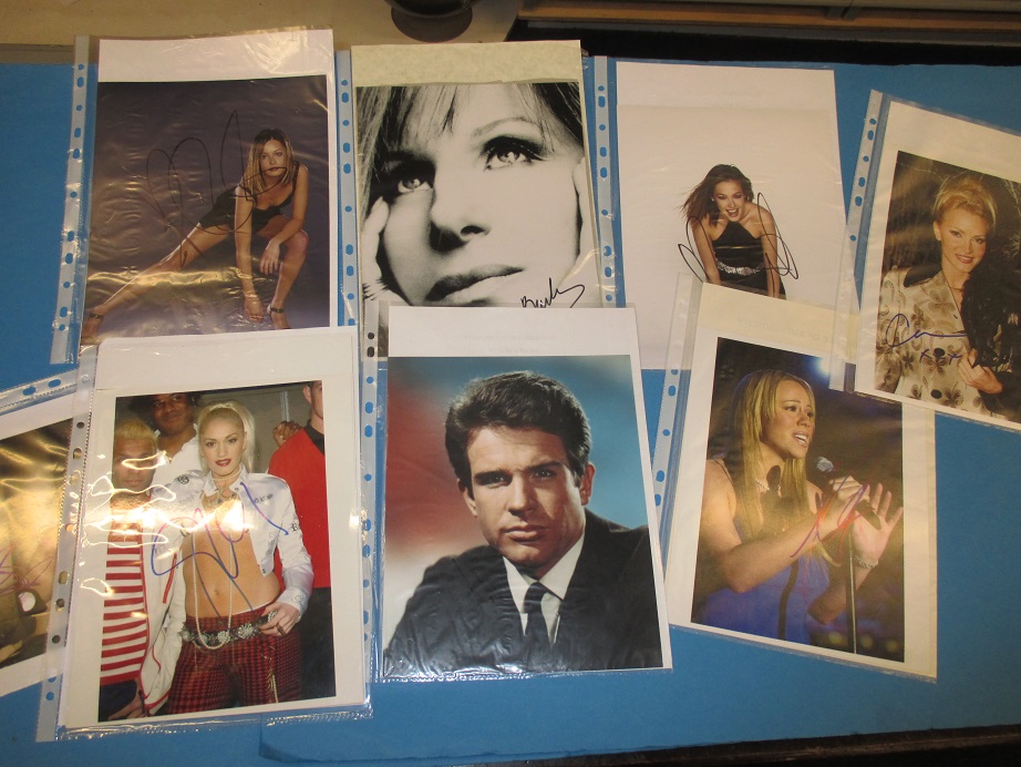 A quantity of signed celebrity photographs, to include Barbra Streisand