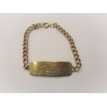 A 9ct yellow gold identity bracelet, approx. weight 23.1g.