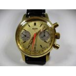 A vintage Elgin chronograph watch with leather strap