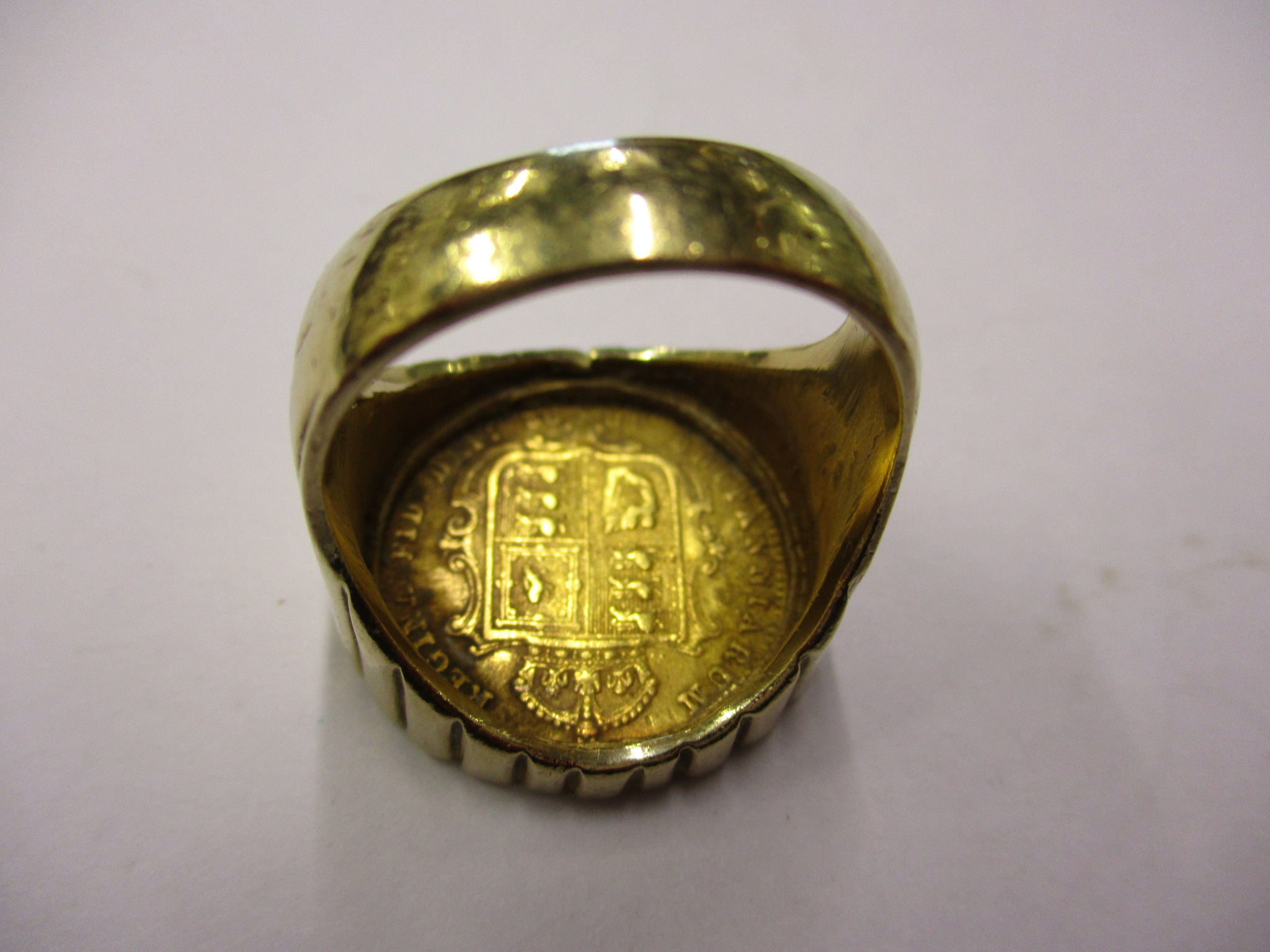 An 1892 gold half sovereign having Jubilee head and shield back set in a 9ct gold ring, approx total - Image 7 of 10