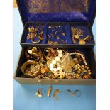 A box of costume jewellery to include approx. 7.2g of gold items