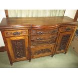 A late 19th century mahogany sideboard with Art Nouveau decoration