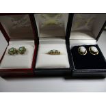 An antique 18ct gold ring set with opals and diamonds and 2 pairs of 9ct gold and opal earrings