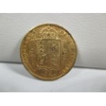 A Victorian gold half sovereign dated 1890.