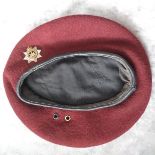 A genuine WWII Devonshire Regiment maroon Airborne beret