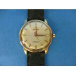 A c1950s vintage 18ct gold cased Omega Geneve automatic watch