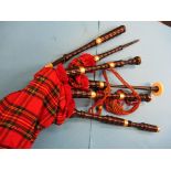 A full set of bag pipes,
