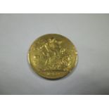 A Victorian full gold sovereign dated 1887