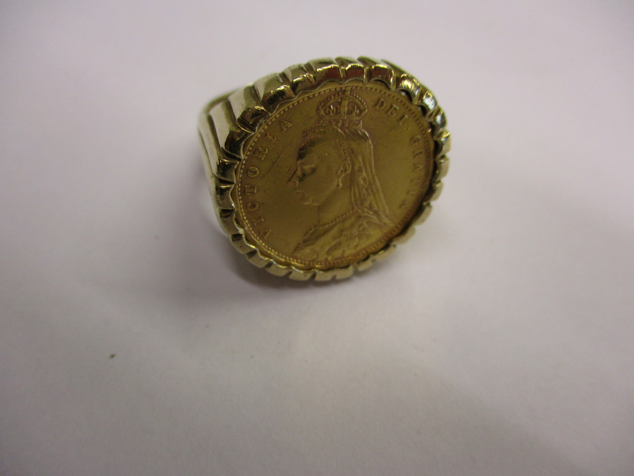 An 1892 gold half sovereign having Jubilee head and shield back set in a 9ct gold ring, approx total - Image 8 of 10