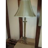 A large vintage brass table lamp