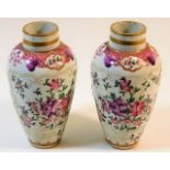 A pair of 19thC. French porcelain vases with hand