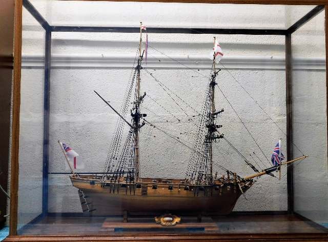 A cased hand built model of HMS Cruiser. Case meas