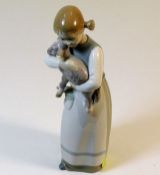 A Lladro porcelain figure of girl with lamb 8.5in