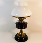 An early 20thC. brass fitted oil lamp 18in high